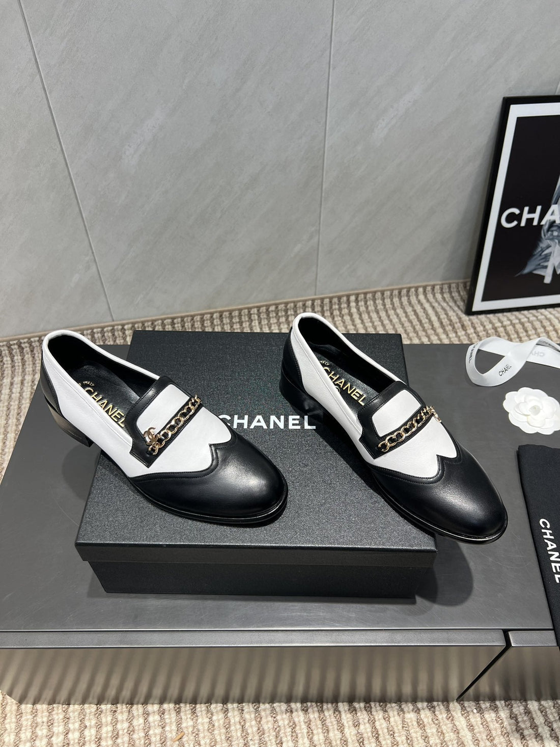 CC 25S Round Toe Chain Loafers In Black And White Cowhide 442533