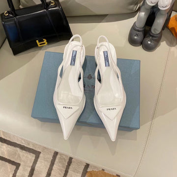 Triangle Logo Slingback Pumps In White Glossy Calfskin