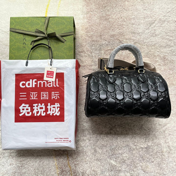 Matelassé Top Handle Bag 31 In Black Embossed Calfskin Gold Hardware