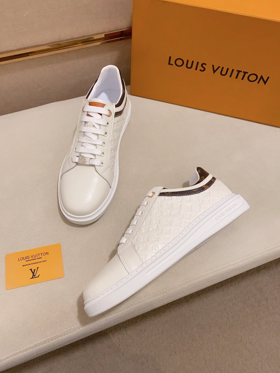 LV Rivoli Sneaker White Mini Monogram-Embossed Calfskin
