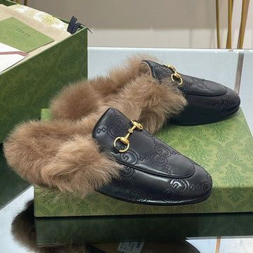 Horsebit Mule In Black Embossed Calfskin And Lamb Wool Lining