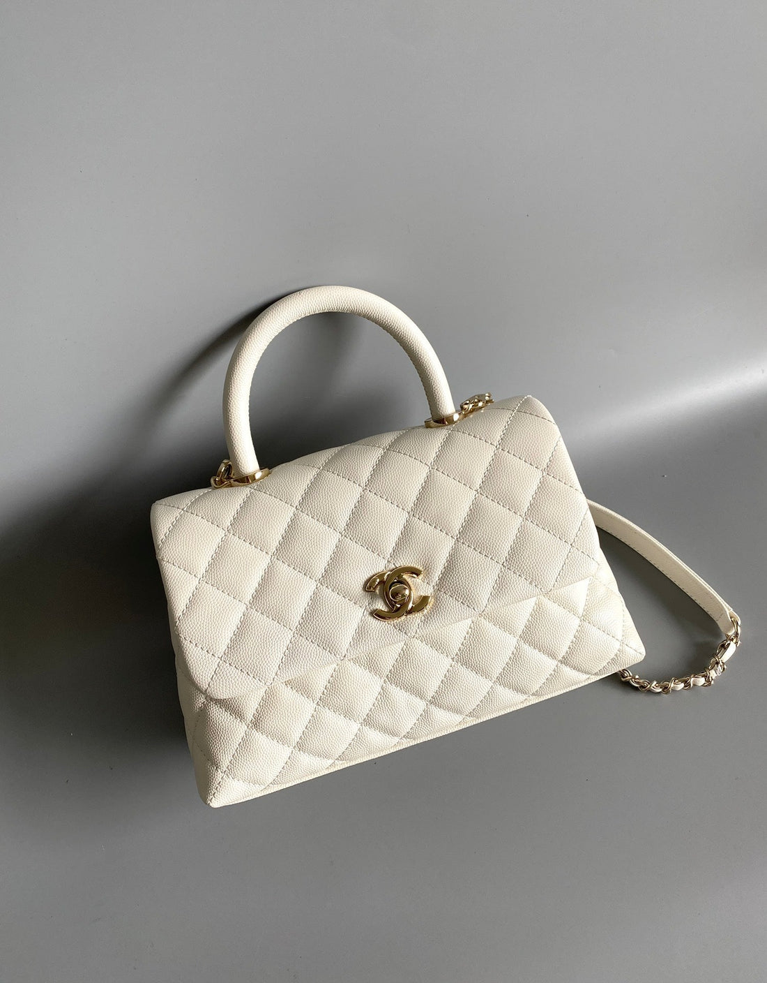 Coco Handle Flap Bag 23CM White Quilted Caviar Light Gold Hardware