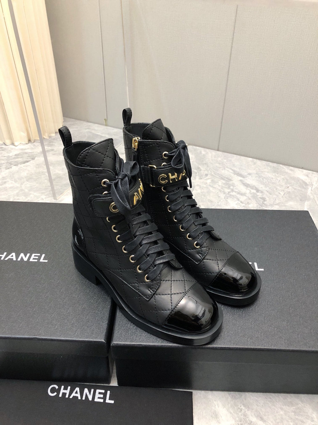 CC Short Boots 45MM In Black Quilted Lambskin And Glossy Cowhide 950042