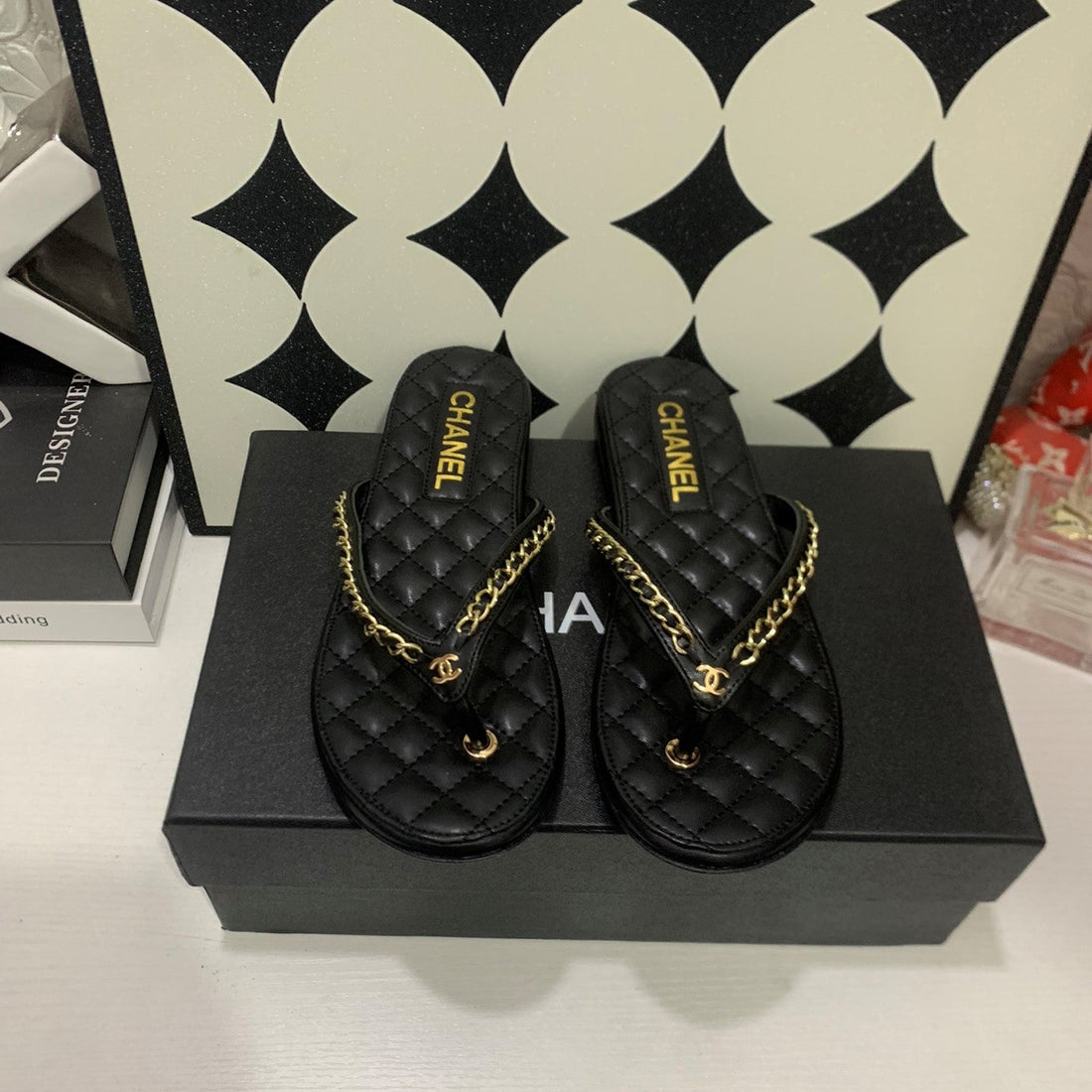 CC 26S Thong With Chain Black Sheepskin 684868