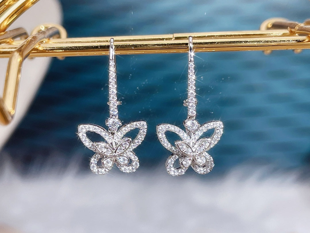 Double Butterfly Silhouette Silver Diamond Earrings