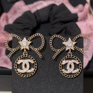 Chanel Black Letter Earrings With White Ribbon And Bow
