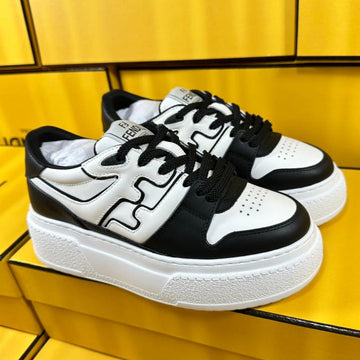 Fendi Thick-Solded Sneaker In White And Black Lambskin