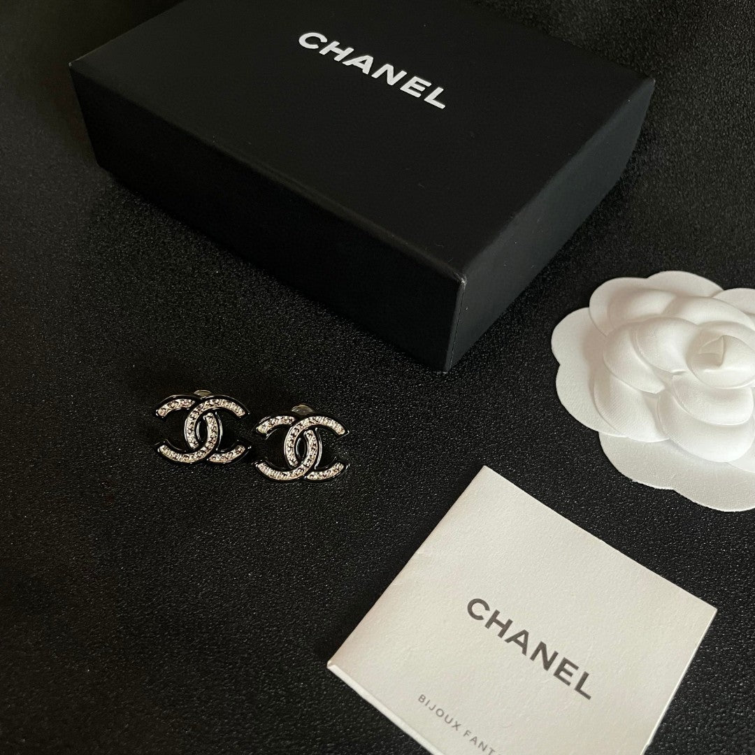 Double C Stud Earrings In Silver Metal With Black Outline And Crystals Inside
