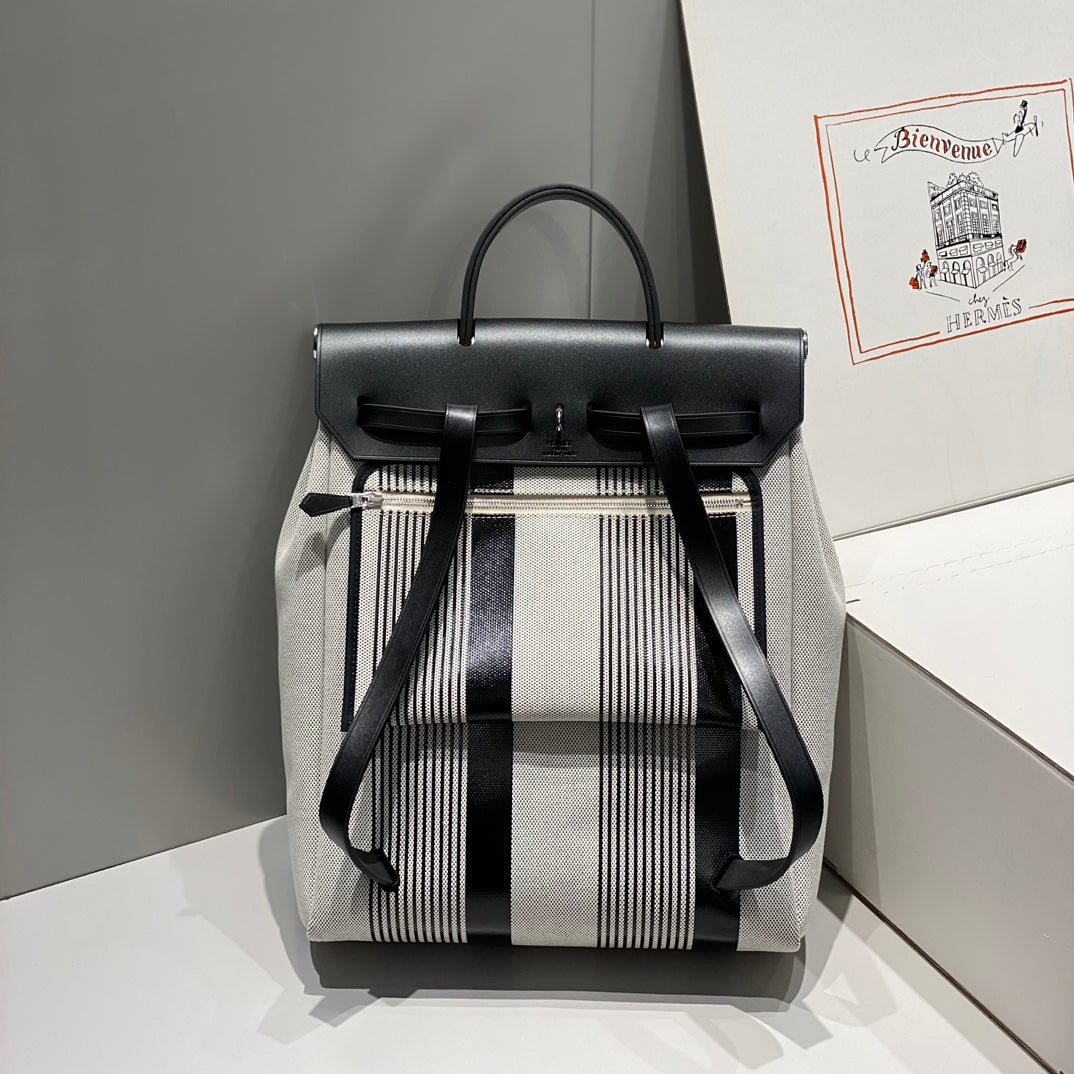 Herbag A Dos Zip Retourne Backpack 29 In Off-White Mix Black Canvas And Calfskin