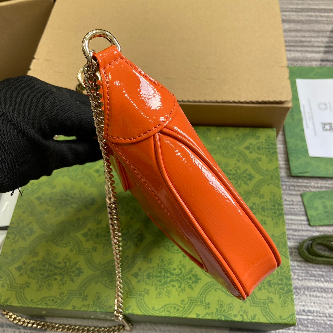 Jackie Notte Mini Bag 19 In Orange Cracked Lacquer Calfskin Gold Hardware