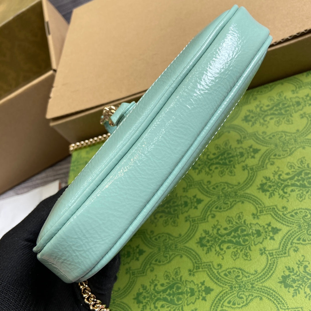 Jackie Notte Mini Bag 19 In Mint Green Cracked Lacquer Calfskin Gold Hardware