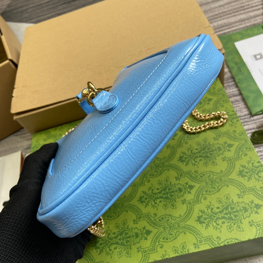 Jackie Notte Mini Bag 19 In Ocean Blue Cracked Lacquer Calfskin Gold Hardware