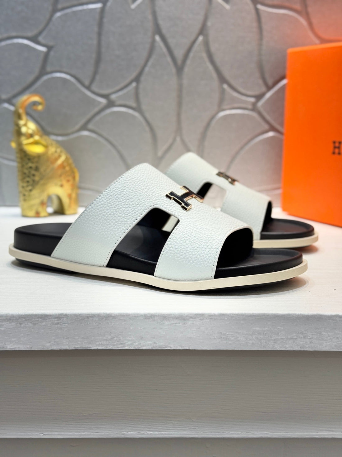 Hm Oran H Black Gold Buckle Slippers In White Cowhide 735244