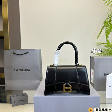 Hourglass Handbag 19 In Black Shiny Box Calfskin Gold Hardware