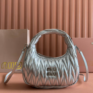 Wander Matelassé Handbag 23 In Silver Patent Lambskin