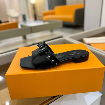 LV X Tm 6AM Flat Mule Black Sheepskin 241219