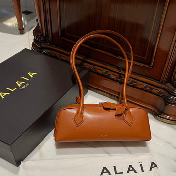 Le Teckel Medium Bag 33 In Bronze Orange Goatskin