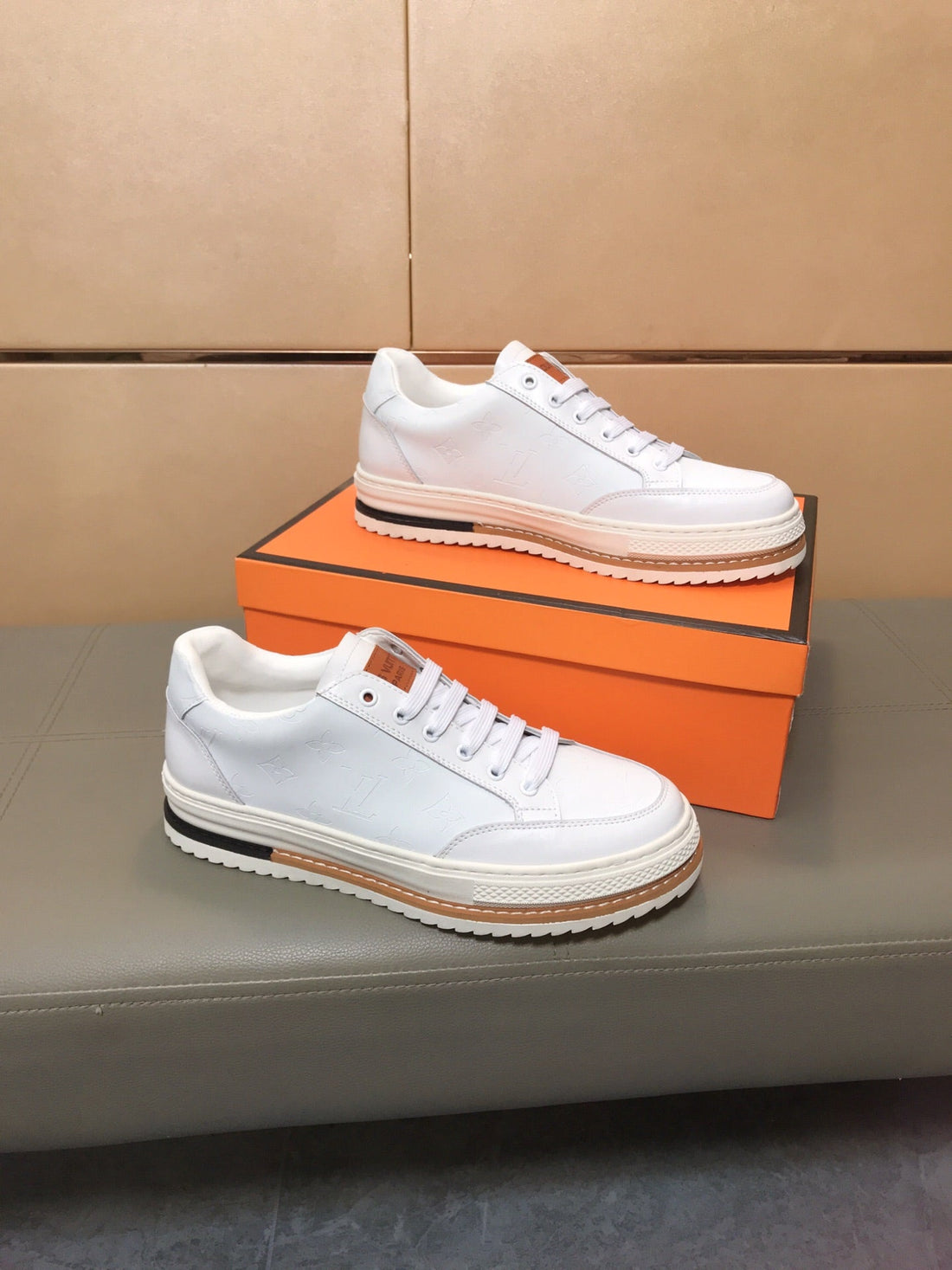 LV Trainer In Embossed White Suede