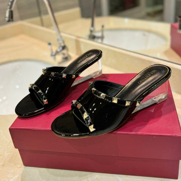 Rockstud Mule Sandals With Transparent Heel In Black Calfskin