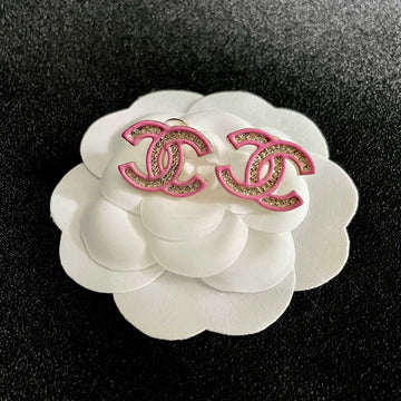 Double C Stud Earrings With Pink Trim And Center Stone