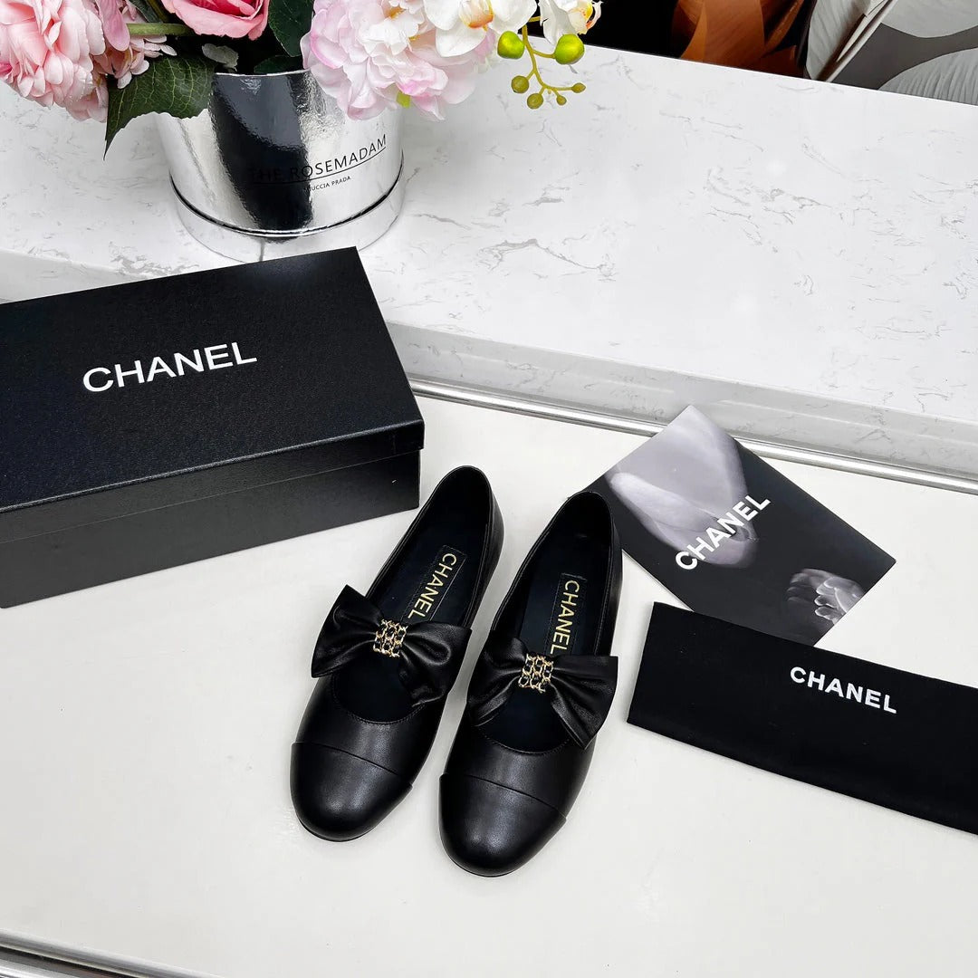 Chanel 25S Mary Janes In Black Calfskin With Bow Gold Hardwre