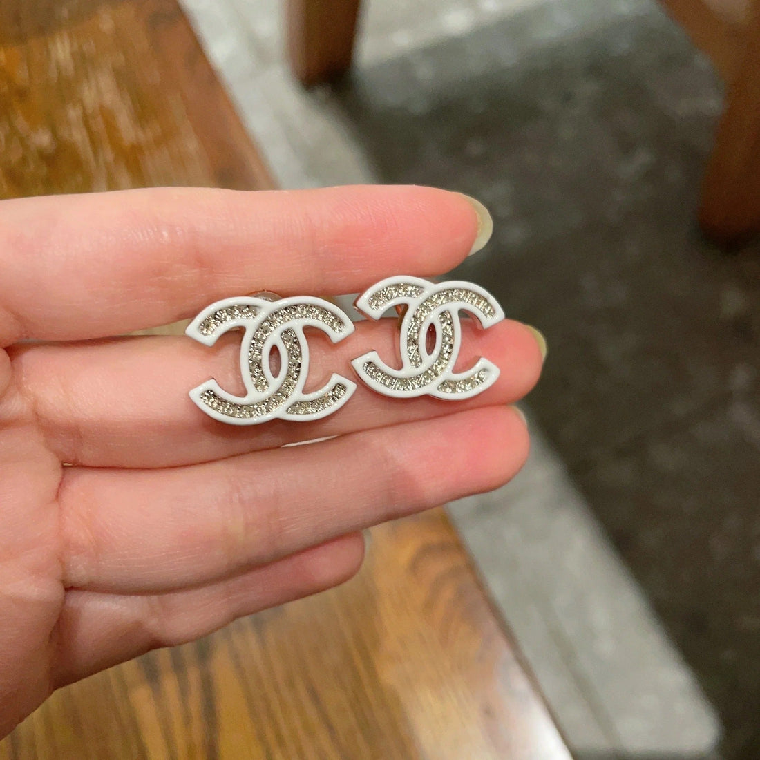 Double C Stud Earrings With White Trim And Center Stone