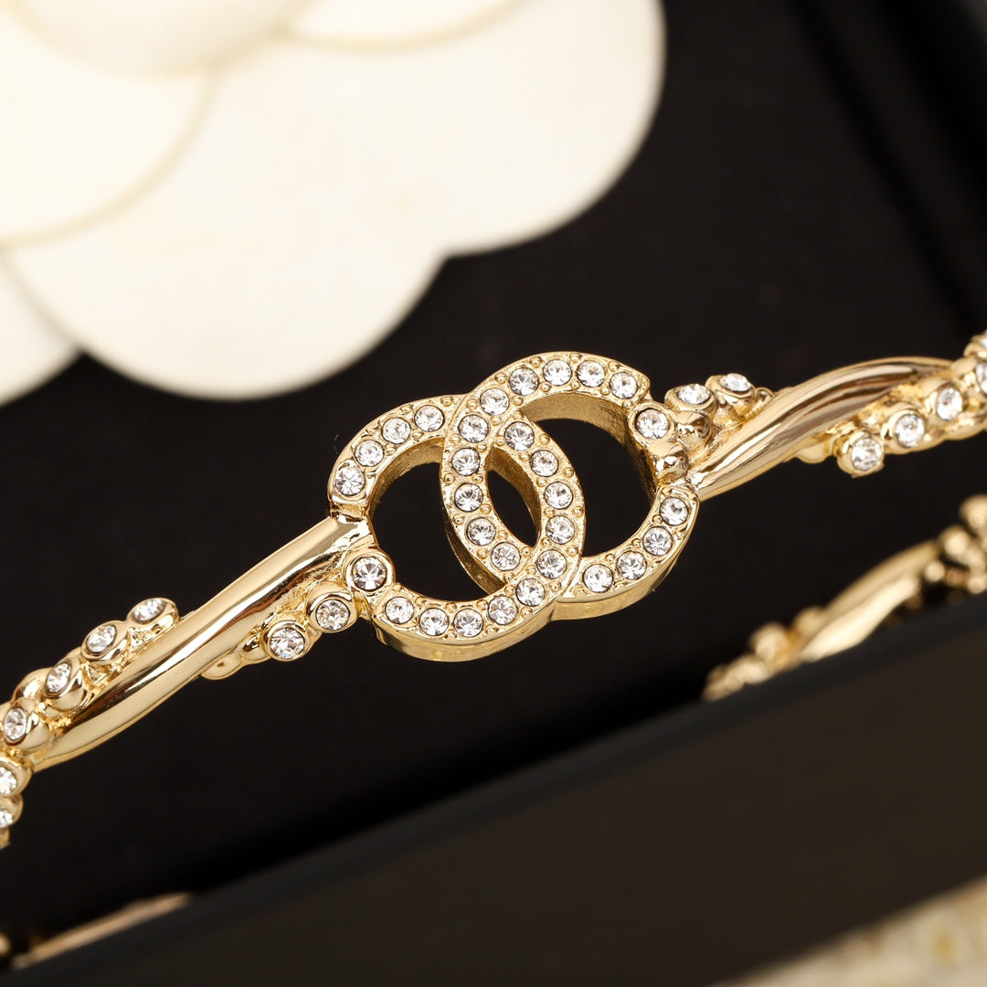 CC Twist Open Cuff Gold Bracelet